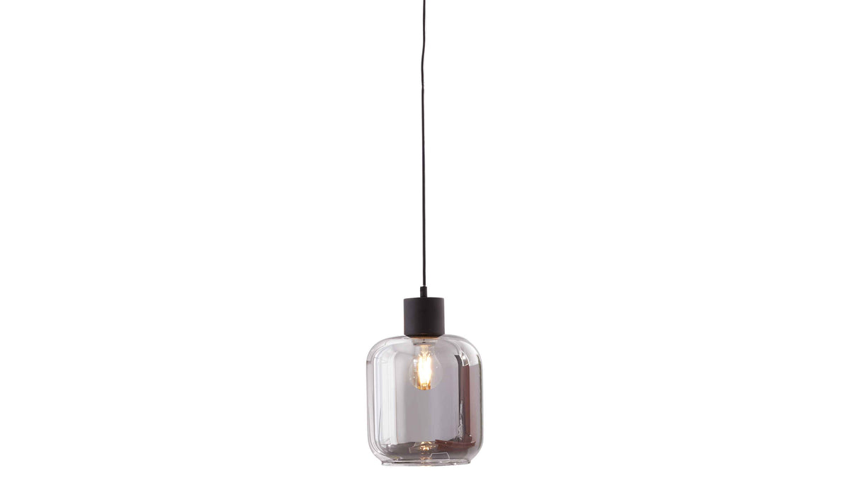 Hängelampe mit schwarzem Kabel und zylindrischer Fassung, klarem abgerundetem Glasschirm und sichtbar leuchtender Glühbirne.