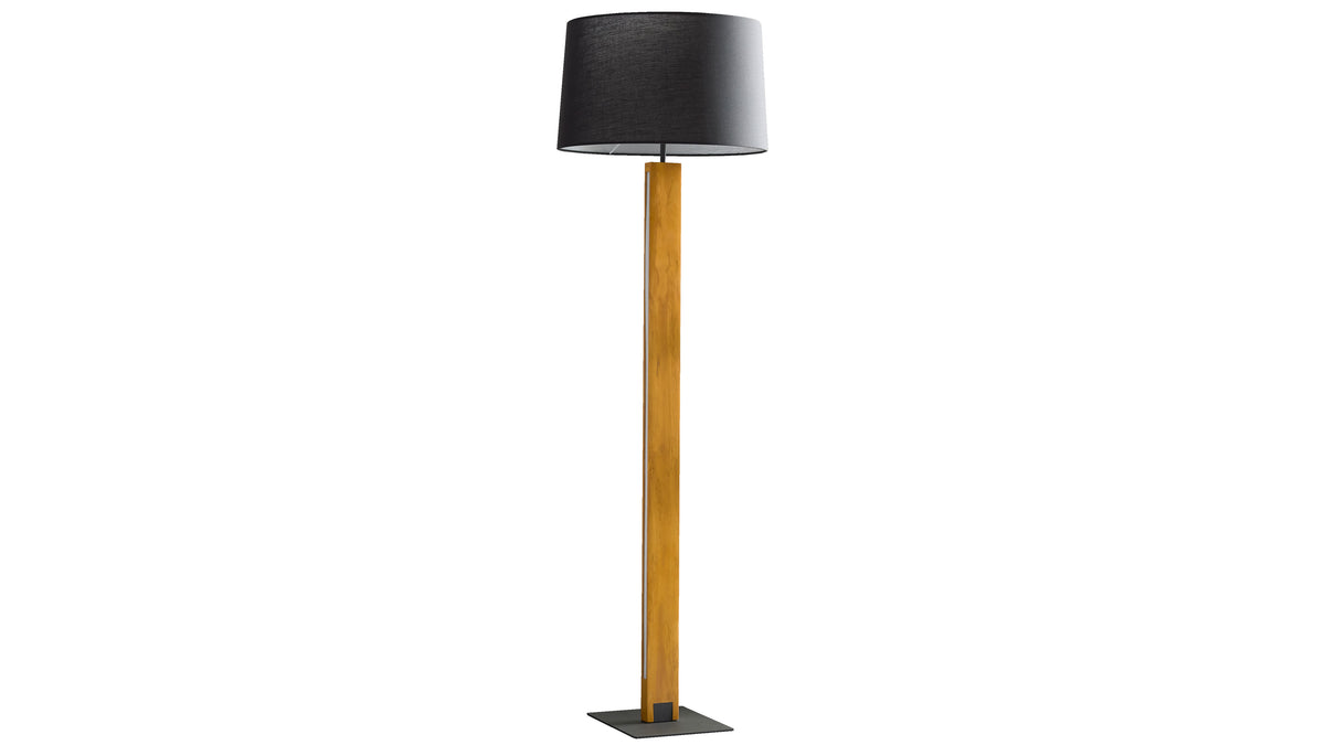 Stehlampe mit schwarzem Zylinderschirm, schlankem rechteckigem Holzstamm, sichtbarem Kabel und schwarzer quadratischer Metallbasis.