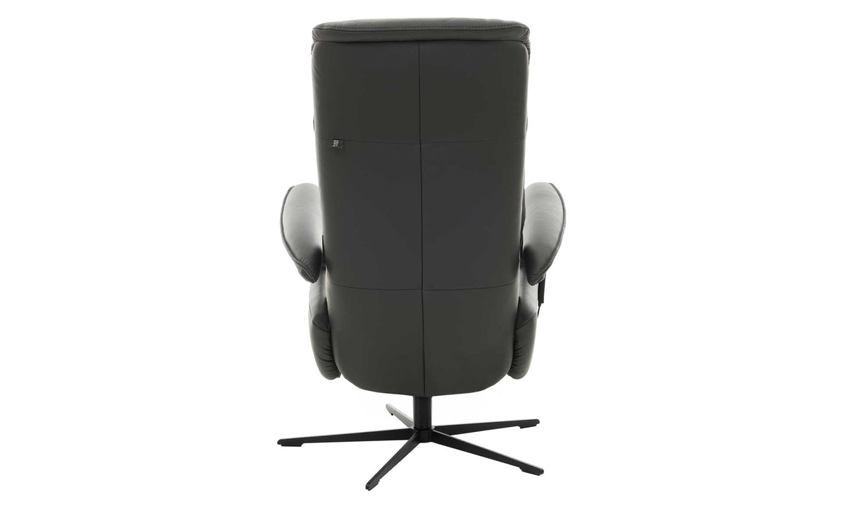 Ein HUKLA® | IL Relaxsessel der Serie 4545 aus Glattleder, von hinten gesehen mit einem drehbaren Metallfuß.