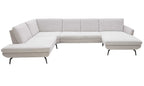 U-förmige Couch in hellem Stoff mit schwarzen Metallbeinen, bestehend aus mehreren modularen Elementen und Rückenlehnen.
