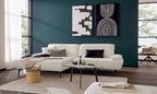 Modernes Wohnzimmer mit ZEHDENICK | IL Interliving Sofa Serie 4306 Jubiläums-Edition, Kunstwerk, runder Tisch und Korb.