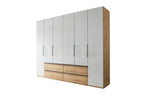 Drehtürenschrank 277468 in Beige-Grau mit Schubladen und Absetzung in Eiche-Nachbildung
