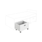 PAIDI Kira Rollbox ohne Sitzpolster, auf Rollen und in verschiedenen Farben, teilweise unter einem Bett hervorgezogen.