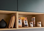Nolte® KÜCHEN U-Küche: Schwarz-Grün & Holz, mit Manhattan-Fronten und Constructa-Geräten, modern und stilvoll.
